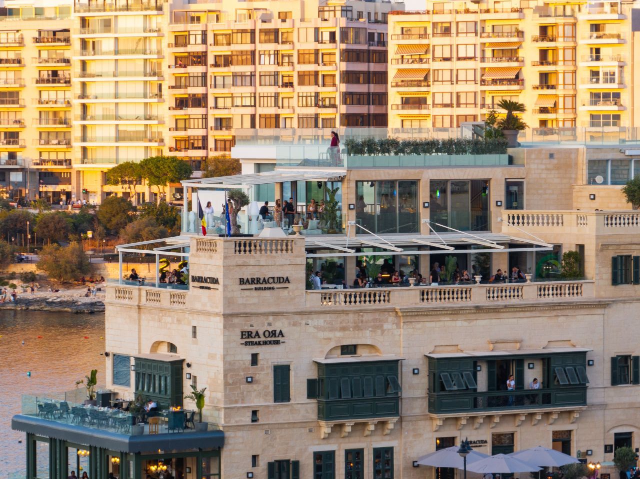Barracuda Building waterfront venue during golden hour